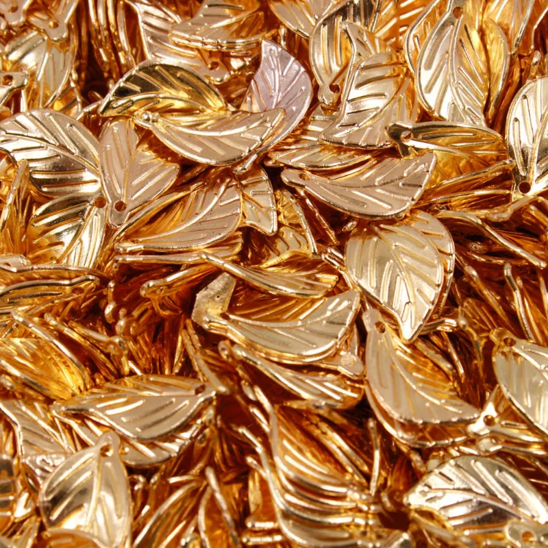 ENTREMEIO FOLHA 11X20MM EM ABS COM 250GR 073 - Dourado