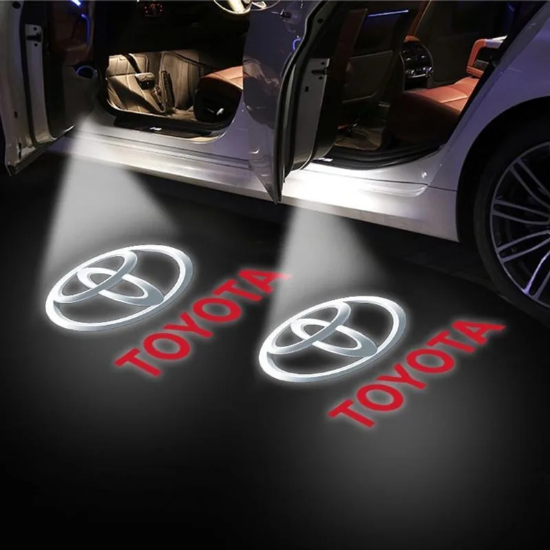 Kit 2 Projetores Porta De Carro Toyota Luz Cortesia Marcas