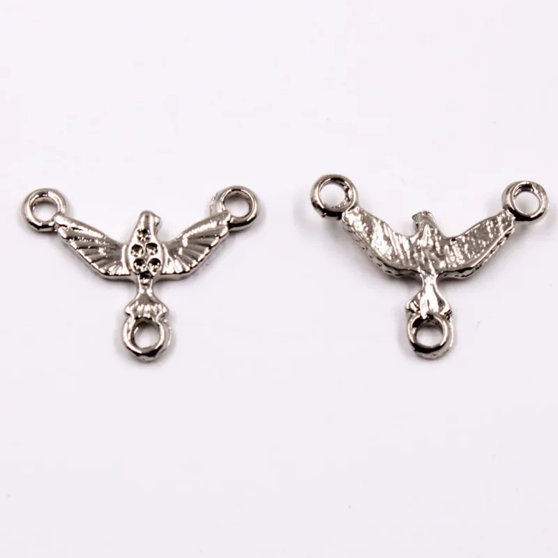 PINGENTE POMBA DA PAZ 21X18MM EM ZAMAC COM 100GR Niquel