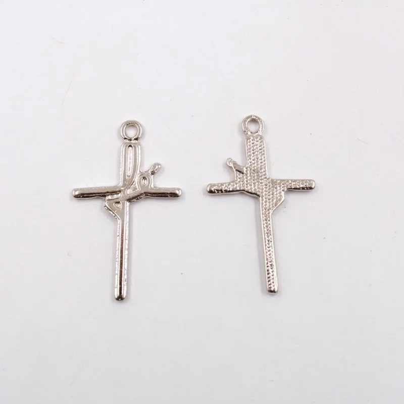 PINGENTE CRUZ FE 33X19MM EM ZAMAC COM 100GR Niquel