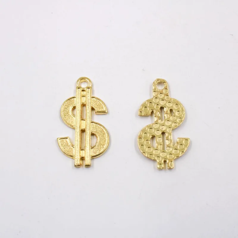 PINGENTE CIFRÃO 30X16MM EM ZAMAC COM 100GR Dourado