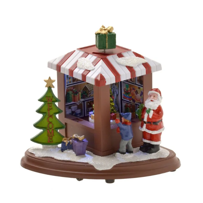 Vila natalina papai noel na loja de brinquedo com arvore