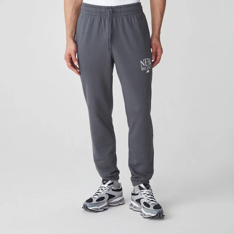 Calça Reimagined Jogger (Sem Felpa) Masculina - New Balance - Confecção