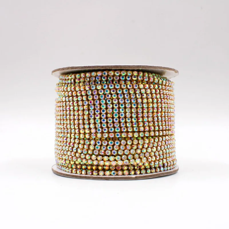 CORRENTE DE STRASS JUNTA SS16 EM VIDRO COM 01 METRO Kr425 - Dourado Ab