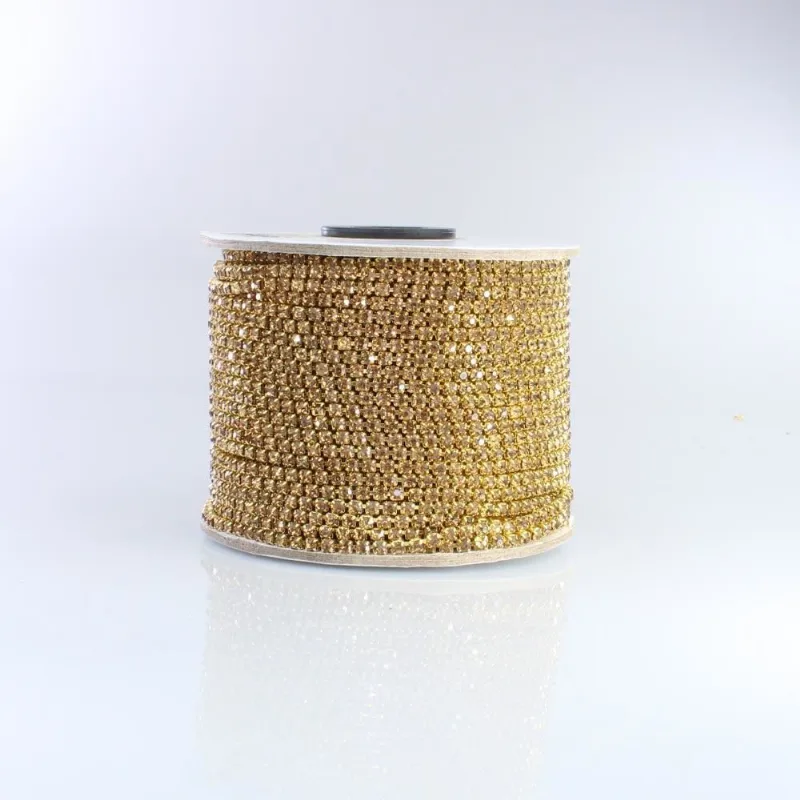 CORRENTE DE STRASS JUNTA SS16 EM VIDRO COM 01 METRO 545 - Dourado + Light Topazio
